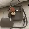 Bolso bandolera de mujer moderno y versátil, bolso de mano con un toque de alta gama, bolso cubo de diseño nicho, bolso cesta, transfronterizo
