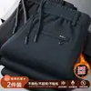 Pantalones casuales de otoño e invierno, forrados de polar y engrosados, pantalones rectos para hombre, corte holgado con cordón, pantalones largos versátiles, pantalones cálidos de invierno para hombre