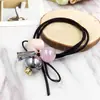 Versão coreana de liga de pérola cristal anel de cabelo atacado laço de cabelo feito à mão corda de couro para cabelo elástico de amor requintado