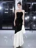 Vestido de Noche Negro sin Tirantes para Socialités de Banquetes, Lujo Ligero de Gama Alta Lentejuelas Temperamento Anfitrión Sirena Volante Vestido Largo