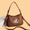 Nova Bolsa Feminina da Moda Transfronteiriça Primavera 2026 com Relevo de Elefante, Grande Capacidade, Versátil para o Dia a Dia, Bolsa de Ombro Cruzada Macia Estilo Retrô