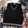 Chaleco de punto blanco estilo universitario con cuello en V para otoño e invierno, top casual de corte holgado para hombres y mujeres