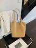 Bolsa de palha grande de alta qualidade para mulheres, nova bolsa de ombro tipo balde casual e descontraída para o dia a dia para mulheres 2026