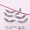 Cuentas de alas de plata de Xizang 100 en un paquete para pulsera collar pendientes de aleación vintage DIY Accesorios Joker Especial transfronterizo