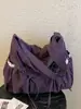 Bolso de hombro a cuadros retro estilo coreano, nueva moda 2026, con detalle de lazo, ofreciendo un look relajado y casual, adecuado para uso en exteriores