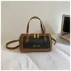 Bolso de mujer con diseño único en bloques de color, nuevo modelo 2026, bolso de mano texturizado para ir al trabajo, bolso de hombro y cruzado simple para el día a día