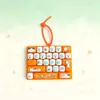 Teclado de dibujos animados lindo de 26 teclas, juguete para aliviar el estrés, colgante de llavero decorativo, venta al por mayor