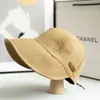 Chapéu de Pescador Estilo Zhao Lusi para Mulheres Primavera e Verão 2023 Chapéu de Sol Anti-UV Chapéu de Sol Preto Liso Venda por Atacado