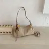 Bolso de mano retro de gamuza de nicho estilo coreano transfronterizo para mujer, nueva colección 2026, adecuado para el uso diario y para ir al trabajo, se puede llevar como bolso de hombro o bolso cruzado