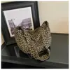 Bolso de lona grande con estampado de leopardo transfronterizo para mujer, nuevo bolso de hombro de moda 2026, bolso cruzado tipo albóndiga para el trabajo