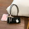 Bolsos de Mujer de Gama Alta de Nicho 2026 Nuevo Verano Casual Lazo de Moda Popular Bolso de Hombro para Debajo del Brazo