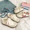 Zapatillas blancas dulces estilo coreano para mujer, nuevas zapatillas ligeras de primavera-verano para estudiantes, zapatillas deportivas, zapatos casuales, zapatos de una sola pieza