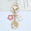 Novo Chaveiro Japonês Romântico Flor de Cerejeira Coelho Coração de Menina Fofo Decorativo para Bolsa Pequeno Pingente Chaveiro Atacado