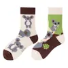 Calcetines originales de moda infantil AB color asimétrico dibujos animados longitud media otoño e invierno caramelos lindos calcetines de algodón para niños y niñas