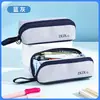 Estilo minimalista nueva bolsa de lápices impermeable y resistente a las manchas, bolsa de papelería de almacenamiento multicapa, gran capacidad, disponible en varios colores, bolsa de papelería escolar