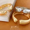 Pulsera redonda abierta de estilo europeo y americano transfronterizo cepillada, con un diseño exagerado y único, una pieza de joyería moderna y a la moda para mujer