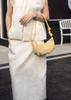 2024 Bolsa Feminina Verão Crossbody Ombro Axila Hornbag Dumpling Bolsa Novo Cetim Chinês Couro Genuíno Nicho All-match Bolsa Feminina