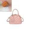 Popular bolsa europea y americana vintage de concha floral, bolso de mano versátil de alta gama, moda transfronteriza 2026, bolso de hombro, bolso cruzado para mujer