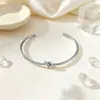 Pulseira Infinito Amor Eterno em Aço Titânio Moda Europeia e Americana Simples Pulseira Aberta Ajustável em Aço Titânio Joia