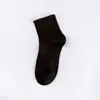 Calcetines para hombre otoño e invierno calcetines de tubo finos color negro blanco gris liso calcetines de algodón absorben el sudor calcetines deportivos calcetines de Zhuji calcetines transpirables para hombre