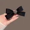 Horquilla con lazo de amor y diamantes de imitación negros para mujer, accesorio para el cabello con media horquilla y parte trasera de la cabeza, con clip de resorte