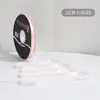 Lazo de regalo de color sólido de 1 cm flor decorativa para envolver material para ramos de cinta de satén venta al por mayor