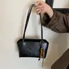 Novo modelo de outono de 2026, bolsa de ombro Yuezhi, bolsa tote estilosa e versátil, moderna por dentro e por fora, bolsa de grande capacidade para usar sob o braço
