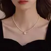 Collar de perlas de doble capa estilo retro francés para mujer, ligero, lujoso, de alta gama, con cadena para el cuello.