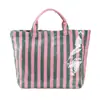 Bolso de mano de PVC a rayas transfronterizo nuevo, bolso de mano elegante y ligero, bolso de hombro portátil de gran capacidad para viajes