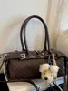 Bolso de mano transfronterizo estilo coreano, bolso pequeño simple y elegante para mujer, nuevo bolso baguette, bolso cruzado casual y único para el día a día