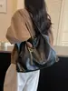 Bolso de axila retro de alta gama de gran capacidad para mujer, nuevo bolso de hombro de moda 2026 para commuting, bolso de mano tipo tote, moderno