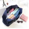 Nueva bolsa de almacenamiento de rendimiento de gran capacidad bolsa de almacenamiento para el hombro bolsa plegable portátil bolsa para avión bolsa de regalo al por mayor en stock