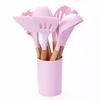 Juego de cocina de silicona de 11 piezas con mango de madera maciza de fábrica y barril de almacenamiento, utensilios de cocina de silicona rosa, nuevo sistema de color