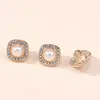 Ventas directas del fabricante: Botones de metal con perlas y tachuelas de diamante para abrigos, chaquetas, camisas, prendas de punto, suéteres y ropa de alta gama, botones versátiles