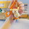 Llavero de Skateboard Sanrio de Dibujos Animados Melody Colgante de Bolsa Creativo Perro de Orejas Grandes Llavero para Llaves de Coche Pequeño Regalo