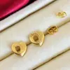 Pendientes de Gancho para Oreja con Nudo Ruyi Estilo Antiguo Chapados en Latón para Mujer, Pendientes de Flor de Lirio Cisne, Pendientes de Botón de Mariposa de Gama Alta de Nicho Venta al por Mayor