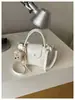 Bolso de Mano de Color Sólido Estilo Coreano con Textura Transfronterizo 2026 Nuevo Diseño Pequeño de Nicho Bolso Cruzado Simple Bolso Dumpling de Gran Capacidad