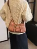 Bolsas de Design de Nicho Transfronteiriças 2025 Nova Moda Retrô Americano Bolsa de Axila Ombro Único Transversal Bolsa Meia-lua Atacado