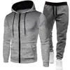 Colección Otoño/Invierno 2026: Sudadera deportiva unisex de lunares con forro polar, conjunto de sudadera con cremallera y pantalones de chándal de color liso para hombre