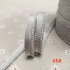 En stock 48 colores poliéster velcro con borde de cordón ribeteado tira de inserción de cuerda para ropa colchas sofás cojines tira de ribete
