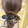Anillo para el pelo de intestino grueso de flor y leopardo de moda, alto valor de belleza, cuerda para coleta de niña, lazo para el pelo Marubeni explosivo