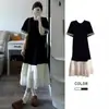 Ropa de maternidad para verano, fina, talla grande, vestido tipo camiseta negro de manga corta, estilo nuevo para mujeres de talla grande, con diseño de retazos para cubrir el abdomen y crear un efecto adelgazante