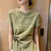 2026 Novo Verão Design Francês Verde Manga Curta Moda Nicho Camisa Irregular com Amarração para Mulheres