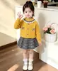 Conjunto de suéter para niña otoño e invierno estilo nuevo falda de cuadros estilo Coco Chanel traje de punto falda de traje bebé versión coreana elegante vestido de princesa