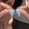 Celebridad de Internet Moda Pendientes de Borla de Circonita Incrustados de Diamante Celebridad Femenina Diseño de Nicho Sencillo Joker Elegante Pendientes Elegantes Venta al por Mayor