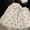 Pijama de forro polar estilo dulce con nudo de mariposa, nuevo conjunto de cárdigan de manga larga de moda otoño/invierno para mujer