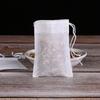 Bolsa de medicina frita desechable con cordón no tejido de 10 * 15 cm, bolsa de medicina china, bolsa de sopa, bolsa de filtro para empaque de té