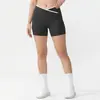Pantalones de yoga de cintura en V europeos y americanos, shorts deportivos cortos de secado rápido para mujer con efecto melocotón en los glúteos, shorts de fitness de cintura alta para levantar glúteos para el verano