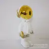 Venta Caliente Lujo Ligero Chapado en Oro Astronauta Adornos de Pie Creativo Astronauta Decoración de Sala de Estar Moderno Simple Entrada TV