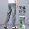 Jeans de hombre ultradelgados de Tencel, corte recto holgado, pantalones largos de seda helada, nuevo modelo de otoño, pantalones casuales elásticos de seda para hombre